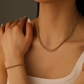 Three-layer gold round snake chain necklace and bracelet jewelry set on model - I814-i812-3 Round 3-piece Gold Set