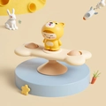 Baby suction cup spinning toy featuring yellow puppy doll on bone-shaped base - Dog Bone Spinner