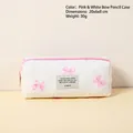 Trousse à cosmétiques en coton matelassé à motifs nœuds rose et blanc 20x6x8cm - Trousse à Nœud Rose et Blanc
