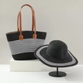 Detail of black and white striped straw tote bag and matching wide-brim sun hat set - Classic Black White Stripe