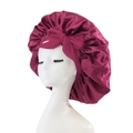 Burgundy satin sleep bonnet for hair care with decorative bow on a white mannequin - Medium Single Layer Cross Ribbon / Burgundy