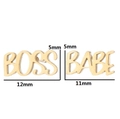 Macro shot of gold Boss Babe stud earrings showing precise dimensions and sizes - BOSS BABE / Gold