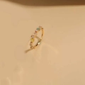 Macro detail of 14K gold plated ring featuring colorful enamel flowers and tiny gemstones - Floral Style (JZ0402)