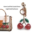 Pink cherry bag charm with green leaves and gold ring, pearlescent resin keychain - Pink Crystal Cherry with Green Leaf (Light Gold)
