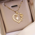Macro view of gold-plated heart necklace with rose flower and Hamsa Hand pendant in a box - 8# White Hamsa Hand