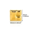 Macro detail of square gold stainless steel ring with textured brushed metal surface - Textured Square