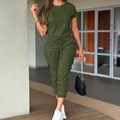 Tuta casual da donna verde militare a maniche corte con coulisse in vita e tasche laterali - S / Verde