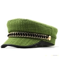 Detail of tweed newsboy cap in green with black leather brim and golden chain trim - 56-59cm / Green