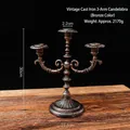 Vintage bronze 3-arm cast iron candelabra with stable base for elegant table decor - Bronze 3-Arm Candelabra