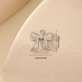 Detailed view of silver bow-knot zircon pendant with 1.5cm x 1.4cm dimensions - Simple Polished Style MYYX00629 / Silver