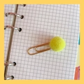 Golden metal paperclip bookmark featuring a soft yellow fluffy pom pom on grid paper - 7# Yellow Pompom