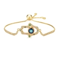 Adjustable golden Hamsa Hand bracelet with blue Evil Eye and micro-set cubic zirconia stones - Gold Chain Black Eye Style