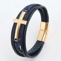 Detailed macro view of men's leather bracelet with golden cross and magnetic buckle - Gold and Navy Blue