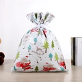 Dettaglio sacchetto regalo Babbo Natale con pupazzo di neve e nastro bianco su legno - 39*51 Pupazzo di Neve Bianco