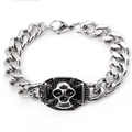 Close-up of mens skull and cross Cuban link bracelet with vintage silver finish - Skull Twelve (Cross) / Silver