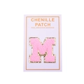 Detail of pink chenille letter M patch with gold glitter border and self-adhesive back - Letter M