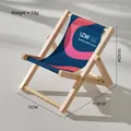Mini wooden folding beach chair phone stand with blue striped canvas and UCW logo - Dark Blue UCW