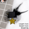 Detail view of mini graduation hat clip with sequins, black feathers and mesh veil - Gold Star Feather