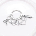 Detailed close-up of medical charms showing stethoscope, syringe, and ambulance - Medical Multi-Pendant
