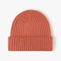 Minimalist winter wool knit beanie in warm burnt orange with thick rib-knit texture - Orange Red