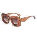 Y2K oversized square sunglasses with translucent amber frame and brown gradient lenses - Tea Frame Tea Lens