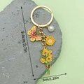 Yellow butterfly enamel keychain with sunflower charms and white pearl on gold chain - Yellow Butterfly Pearl Sunflower (ER1540)