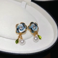 Detailed macro shot of vintage blue enamel flower earring with pearl and diamond center - Blue White Gradient Enamel Pearl Silver Needle Style (45#)