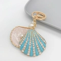 Llavero de concha azul con diamantes brillantes y perla blanca en aro dorado - Llavero Estándar / Concha Azul
