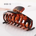Large amber tortoiseshell hair claw clip with black accents and durable metal spring - Amber with Black Spots