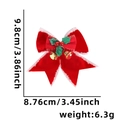 Red velvet Christmas bow with green holly leaves, golden bells, and size dimensions - Style G