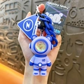 Creative purple astronaut bear keychain with sunset lamp effect and blue chain accent - Trendy Sunset Lamp Bear Pendant / Purple