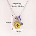 Detail view of titanium necklace with colorful enamel charms and zircon pendants - Style 1 Platinum