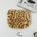 Detail shot of plush leopard print makeup bag featuring high-quality faux fur material - Makeup Bag / Yellow Large Leopard