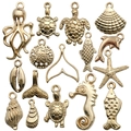 15-piece gold ocean series alloy charms featuring shells, sea turtles, and dolphins - Mixed 16Pcs Ocean Set SN598