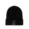 Close-up of I'M COLD white embroidery on a black ribbed knit beanie hat folded cuff - Black