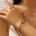 Conjunto de joyas en oro rosa con diseño fluido ajustable de brazalete y anillo - Juego de pulsera + anillo de diseño fluido / Rosa oro