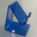 Minimalist transparent blue acrylic phone and tablet stand with a modern thick design - Klein Blue