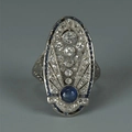 Vintage Art Deco hollow ring featuring oval blue sapphire and pavé-set zircons - US 6 / White Gold