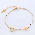 Elegante pulsera de acero inoxidable dorado con dije de corazón hueco y cadena ajustable - Dorado