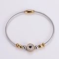Detail of two-tone braided wire bracelet featuring heart motif and magnetic clasp - Gold Clasp Silver Style / Gold and Silver