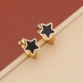 Detailed close-up of gold stainless steel hoop earrings with black oil-drop star pendants - Five-pointed Star