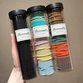 Three-pack of multicolor braided elastic hair ties in transparent storage jars - Black + Forest + Spring (300 Pcs/Can)