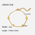 Dettaglio di ciondoli a cuore in oro 18K su catena in acciaio con dimensioni - Oro