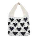 Knitted tote bag featuring black heart pattern with contrast stitching on white fabric - Apricot