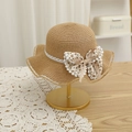 Dettaglio cappello di paglia per bambina con pizzo, bordo ondulato e fiocco grande - S (Bambini 52cm 1-6 anni) / Cappello Cachi