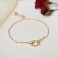 Elegant adjustable gold bracelet with interlocking circles and sparkling cubic zirconia - Gold Interlocking Circles