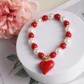 Exotic red heart pendant beaded bracelet with red and white pearls on white stand - Style A-Red Heart
