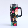 Detail of 40oz stainless steel tumbler featuring festive Santa and Christmas tree patterns - Santa with Christmas Tree