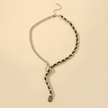 Good Luck charm necklace featuring a woven leather chain and shimmering rhinestone details - Gold