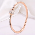 Rose gold titanium steel bracelet featuring multiple rows of sparkling white zircon crystals - Rose Gold